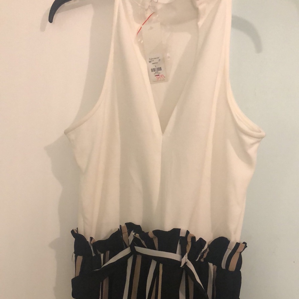 Francesca’s brand new never worn jumpsuit! Size Large.